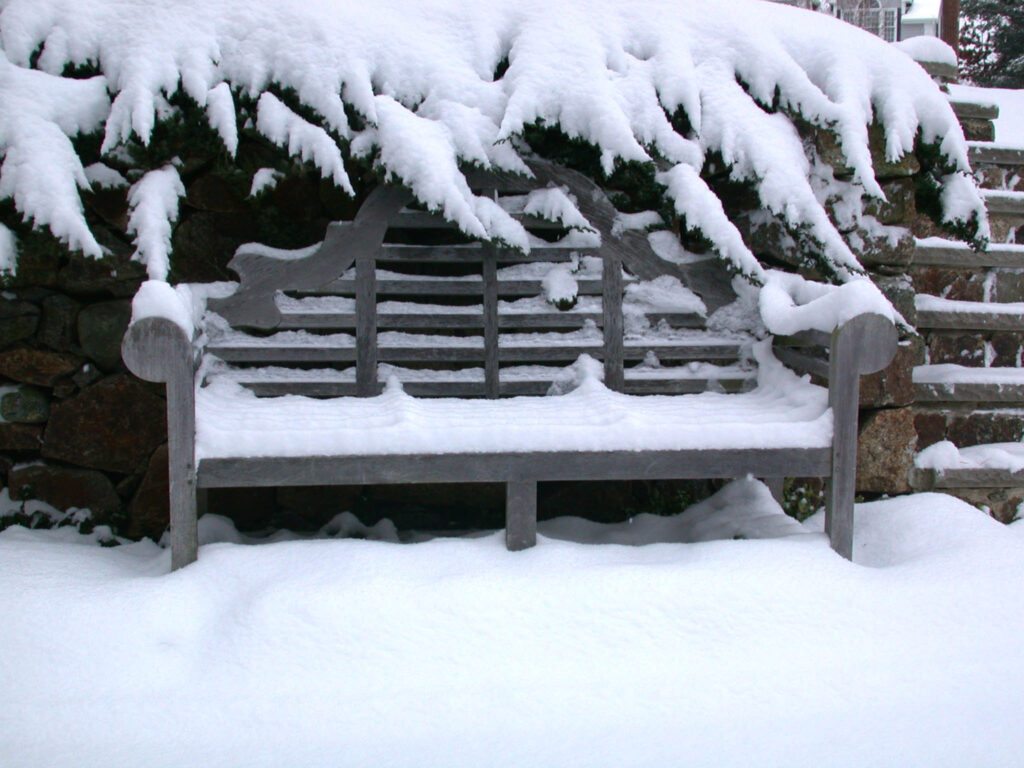 GOLDENTEAK Lutyens Bench in the Snow. This bench is 28 years old in 2025