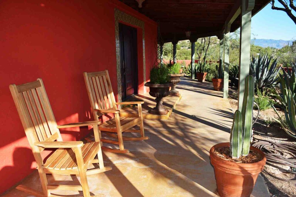 Outdoor Rocking Chairs on a serene teak wood porch