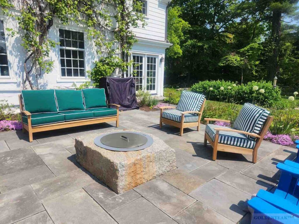 cozy teak deep seating conversation set on a sunlit porch