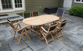 Teak Dining Set , expandable oval table, 2 Recliner Chairs and 4 Providence chairs with Black Sling Fabric
