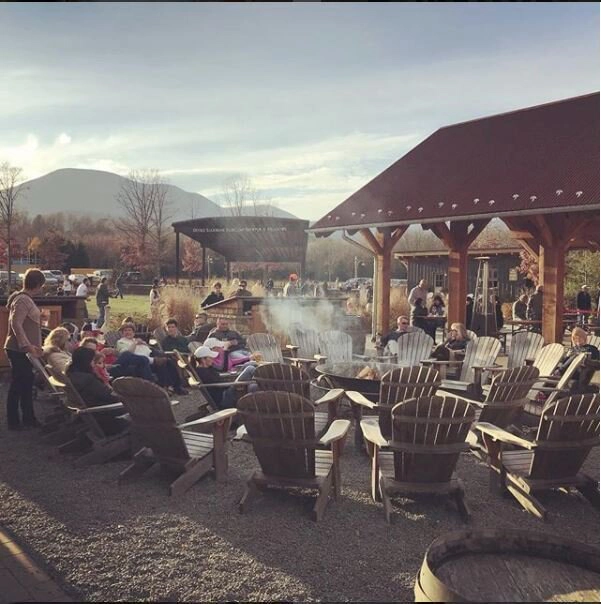 GOLDENTEAK Teak Adirondacks at Devils Backbone Brewery Site Furnishings
