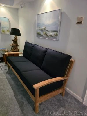 GOLDENTEAK  Teak Outdoor Sofa and Club Chair used INDOORS