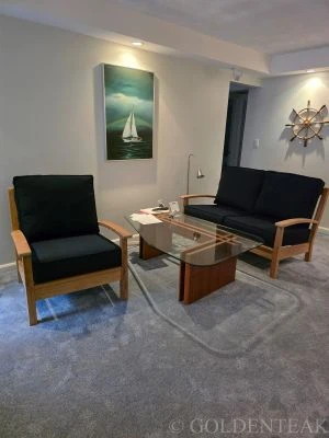 GOLDENTEAK  Teak Outdoor Sofa and Club Chair used INDOORS