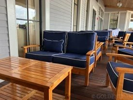 Goldenteak Teak Outdoor Loveseats, Club Chairs and coffee tables at Country Club