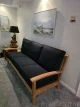 GOLDENTEAK  Teak Outdoor Sofa and Club Chair used INDOORS