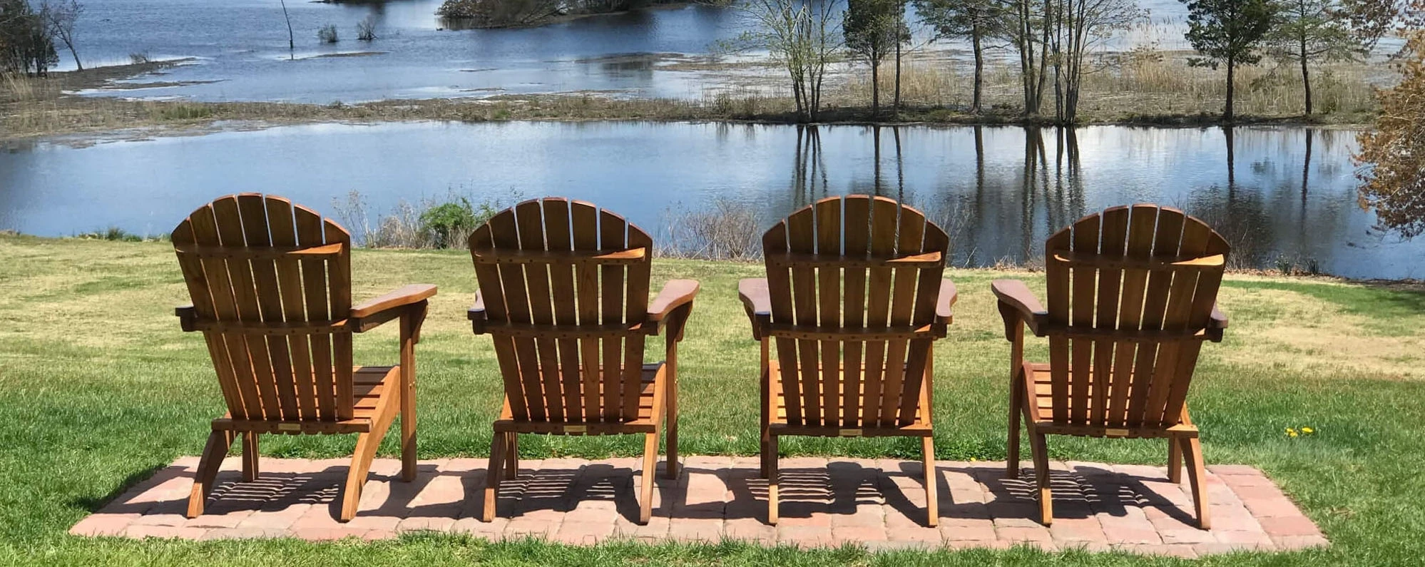 Adirondacks from GOLDENTEAK overlooking a river