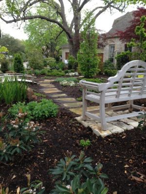 Goldenteak Teak Lutyens and Chippendale Bench lush garden - customer photo